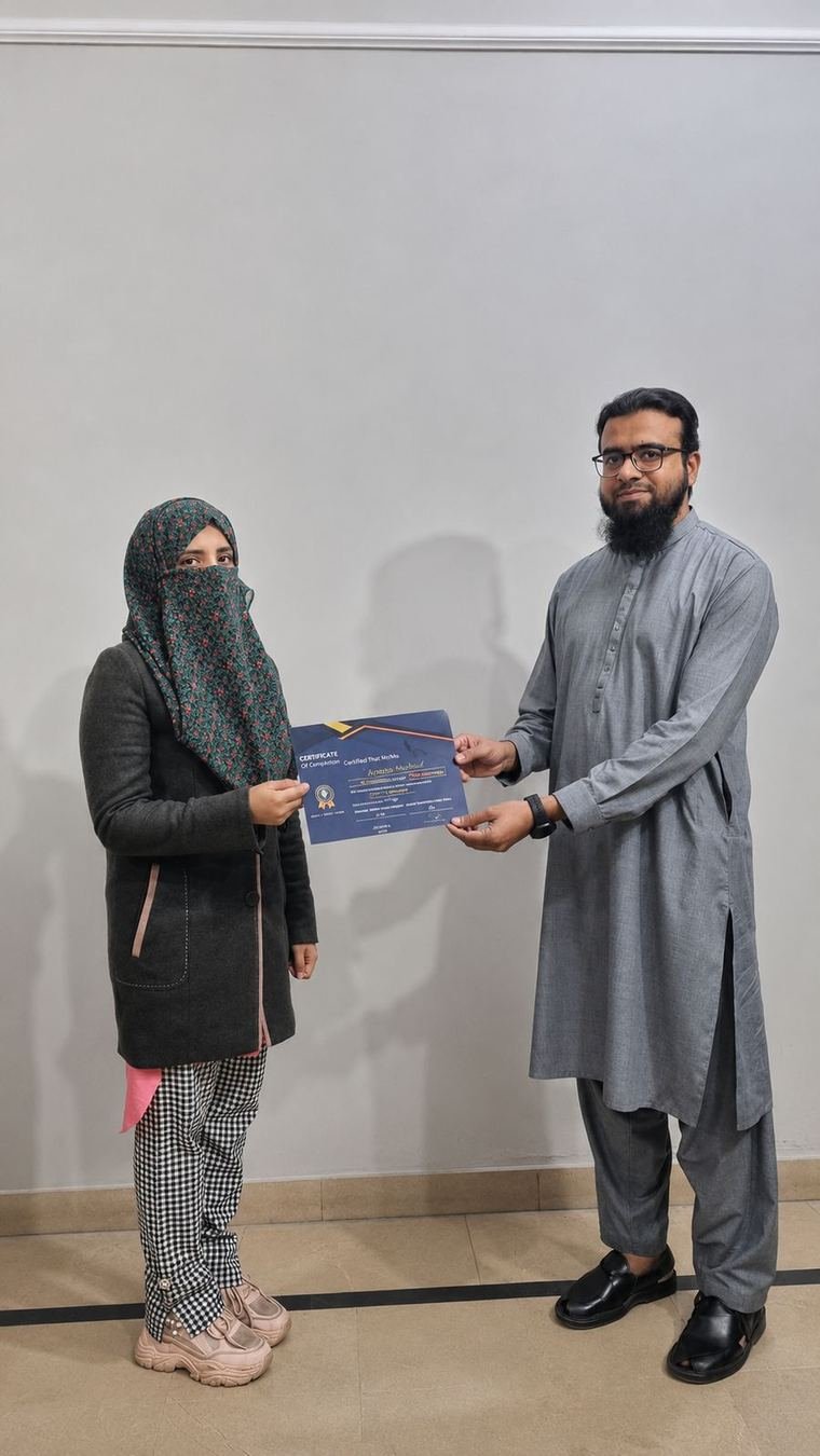 InnoTech graduate receiving a certificate at the Jubilee Town campus